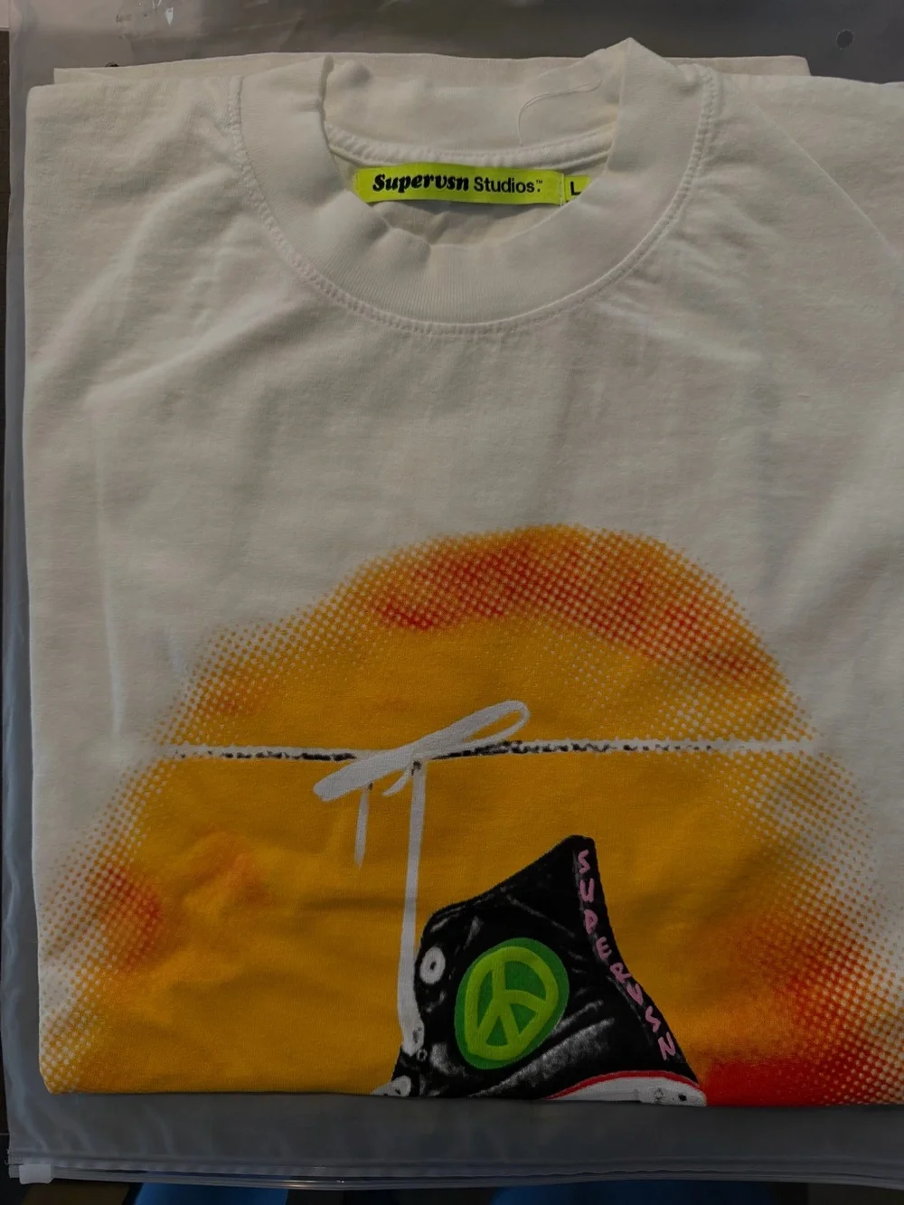 Suprvsn - Graphic Sneaker Tee with Orange-Red Burst